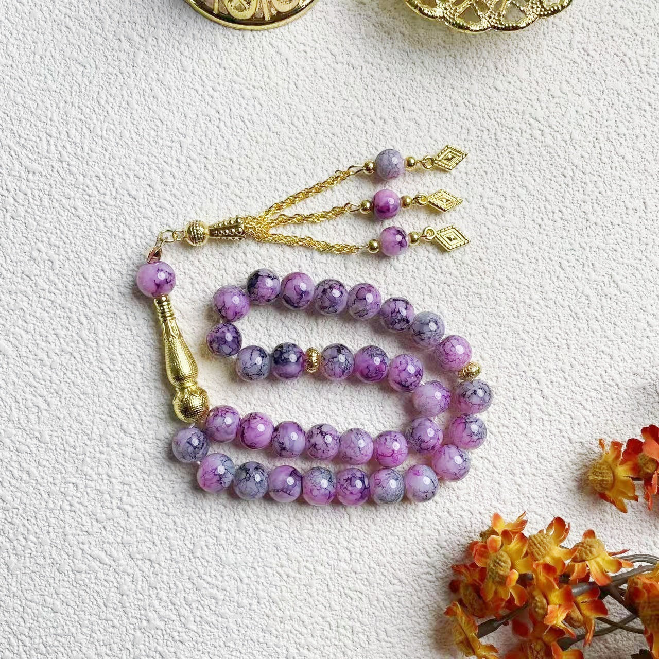 33-piece Gold Tassel Glass Bracelet With 10mm Large Flower Beads 📿                                                               . 33-delige gouden armband met kwastjes en glazen kralen, inclusief grote bloemkralen van 10 mm📿